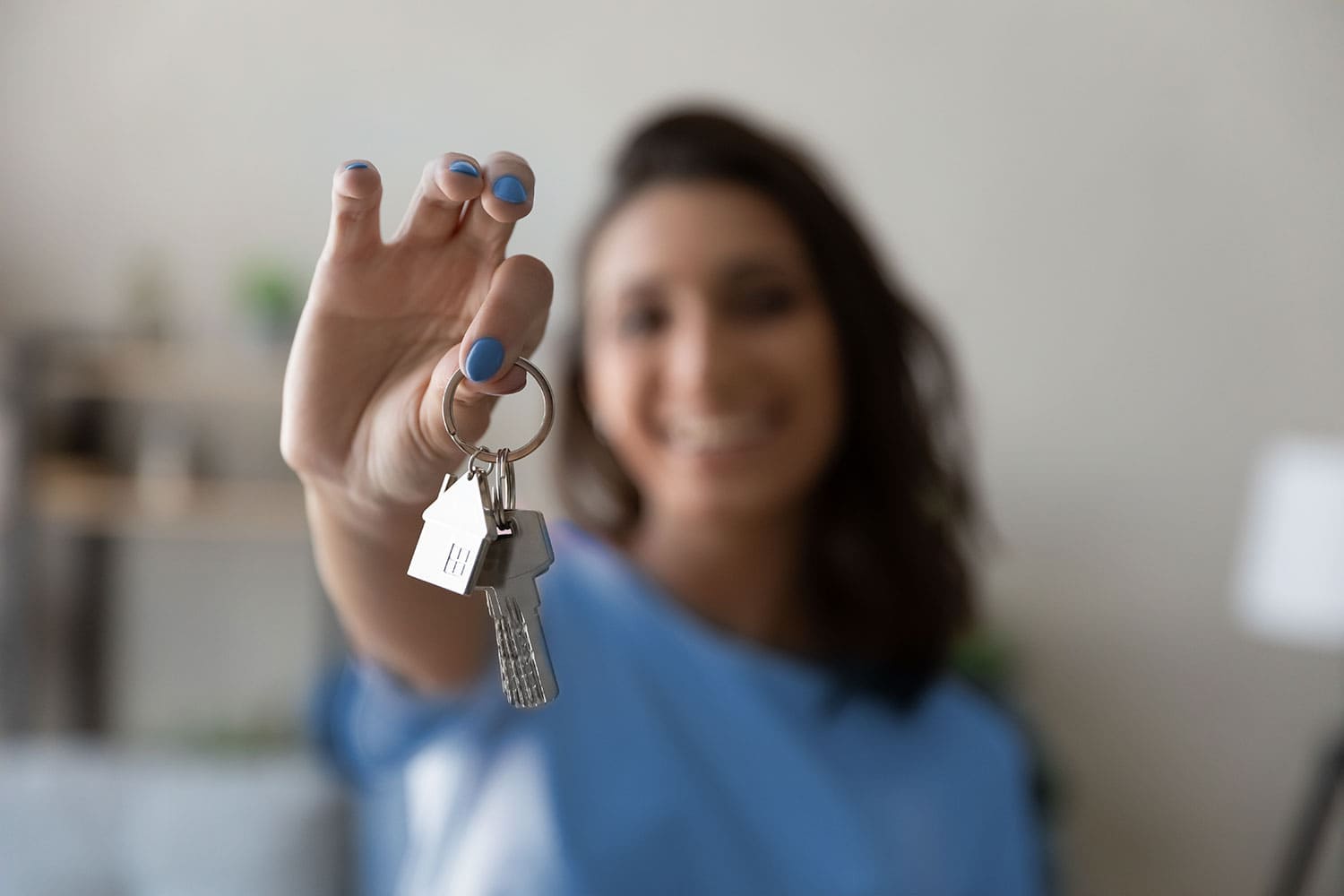 Now Selling - Pratt Homes - Lady holding house key