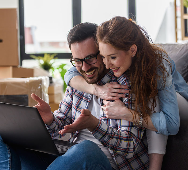 Move-In-Ready Homes Noew selling couple on computer looking